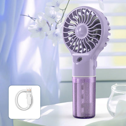 🏖️❄️ Ventilatore portatile a mano con nebbia rinfrescante – fresco ovunque tu vada! 💦🌬️